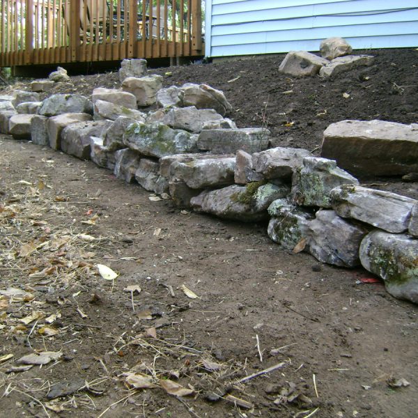 Natural stone retaining wall