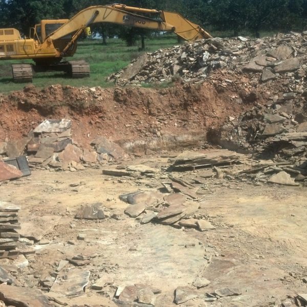 Excavating natural stone in progress